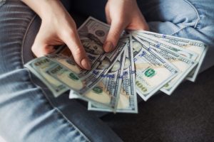 how-to-stop-spending-money-alexander-mils-lCPhGxs7pww-unsplash-scaled